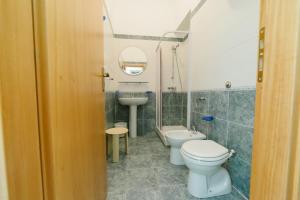Koupelna v ubytování Albergo Marla