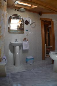 Łazienka w obiekcie Hostal Casa Maria