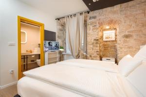 Posteľ alebo postele v izbe v ubytovaní Luxury Rooms Bajamonti