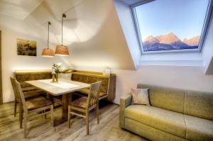 Posedenie v ubytovaní Gasthaus Brandlwirt
