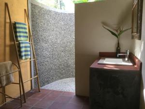ห้องน้ำของ Guesthouse Taman Ayu