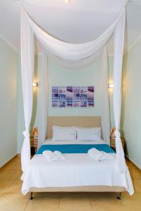 Llit o llits en una habitació de Kaplanis House