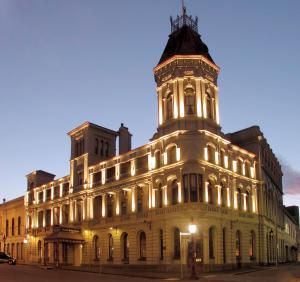 a large building with a clock on the front of it at Craig's Royal Hotel in Ballarat