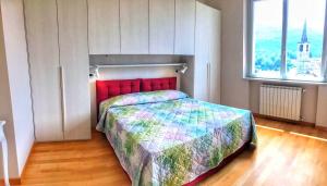Postel nebo postele na pokoji v ubytování Oleandro 2 apartment in Villa Cerutti