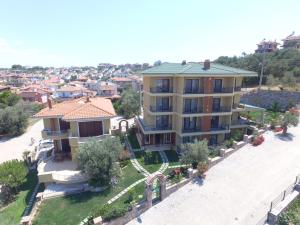 an aerial view of a large house in a city at Nilüfer Butik Otel in Ayvalık