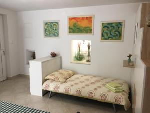Кровать или кровати в номере Apartment Filipas