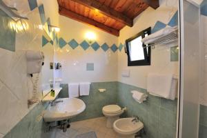 Koupelna v ubytování Hotel L'Esagono