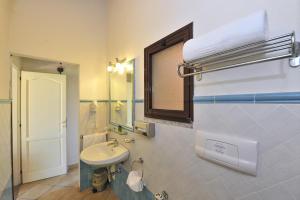 Koupelna v ubytování Hotel L'Esagono