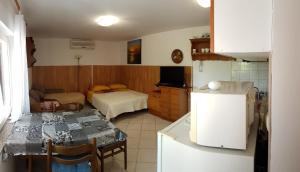 Kuchyň nebo kuchyňský kout v ubytování Apartments Brčić