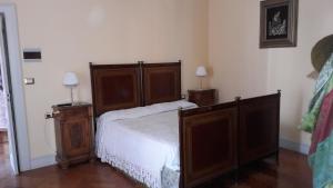 Postel nebo postele na pokoji v ubytování B&B Casa Laviano