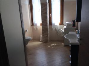 Koupelna v ubytování Hotel Rezia