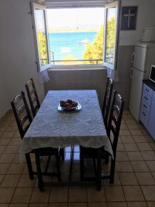 Kuchyň nebo kuchyňský kout v ubytování Apartment Grubelic
