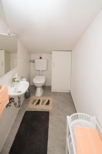 Kúpeľňa v ubytovaní Apartman Marinko + 26 fotografií