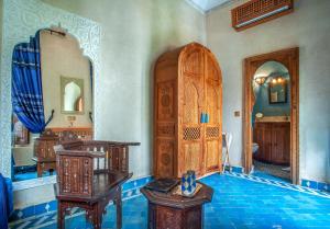 Postel nebo postele na pokoji v ubytování Riad & Spa Laurence Olivier