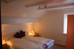 Letto o letti in una camera di Haus Schwalbennest