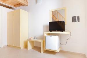 TV a/nebo společenská místnost v ubytování Via dei Mari Guest House