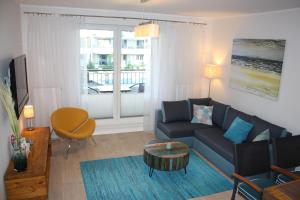 Posedenie v ubytovaní Apartament Szmaragdowy
