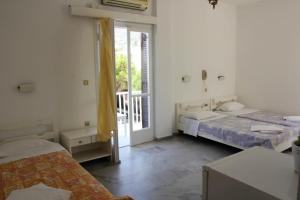 Posteľ alebo postele v izbe v ubytovaní Hotel Zannet