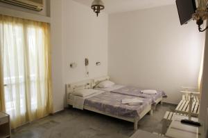 Posteľ alebo postele v izbe v ubytovaní Hotel Zannet