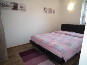 Postel nebo postele na pokoji v ubytování Apartment 1