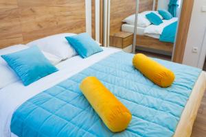 Posteľ alebo postele v izbe v ubytovaní Žal Beach Apartments