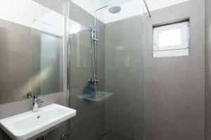 Kúpeľňa v ubytovaní Žal Beach Apartments