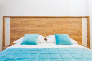 Posteľ alebo postele v izbe v ubytovaní Žal Beach Apartments