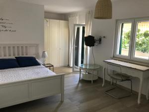 Postel nebo postele na pokoji v ubytování Guesthouse Davorka Bijelić