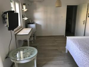 TV a/nebo společenská místnost v ubytování Guesthouse Davorka Bijelić