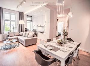 Posedenie v ubytovaní Family Luxury Wonder Heaven Apartment, 50m to M Cassino, first with 3 badrooms&studio, second with 2 badrooms&studio, parking w cenie