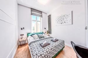 Posteľ alebo postele v izbe v ubytovaní Family Luxury Wonder Heaven Apartment, 50m to M Cassino, first with 3 badrooms&studio, second with 2 badrooms&studio, parking w cenie