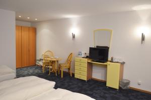 Postel nebo postele na pokoji v ubytování Hotel B8 Voerde