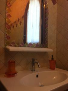 Koupelna v ubytování I Mari Di Gallura Suites and Rooms