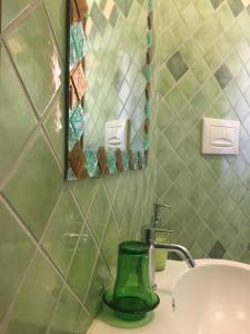 Koupelna v ubytování I Mari Di Gallura Suites and Rooms