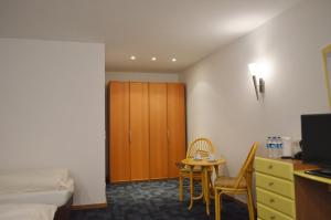 Postel nebo postele na pokoji v ubytování Hotel B8 Voerde
