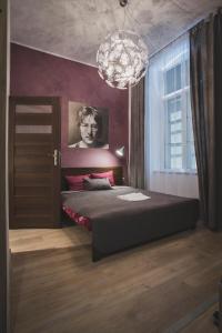 Posteľ alebo postele v izbe v ubytovaní Apartamenty Nowy Rynek