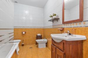 Ein Badezimmer in der Unterkunft Apartamentos Blanca Senda del Oso