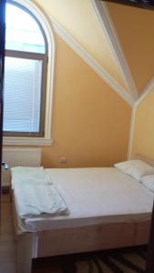 Postel nebo postele na pokoji v ubytování Guest house Ćane Smestaj + 3 fotografie