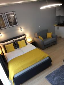 Posteľ alebo postele v izbe v ubytovaní Apartament Nowa Motława & SPA + 21 fotografií