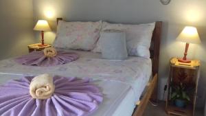 Cama ou camas em um quarto em Maracujá Hostel