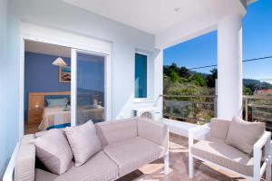 Olive Garden Villas and Apartments的休息区