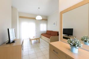 TV a/nebo společenská místnost v ubytování Olive Tree Apartments