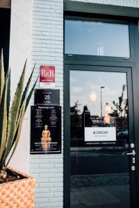 Certifikát, hodnocení, plakát nebo jiný dokument vystavený v ubytování B&B A Dream City spa & Massages