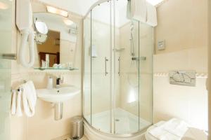 Koupelna v ubytování Royal Suites