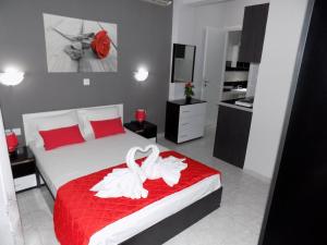 Postel nebo postele na pokoji v ubytování Niriides Rooms
