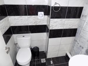 Koupelna v ubytování Niriides Rooms