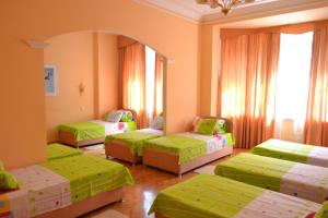 Postel nebo postele na pokoji v ubytování Lviv Euro Hostel