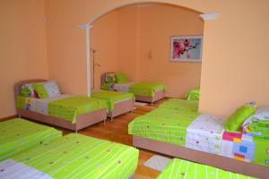 Postel nebo postele na pokoji v ubytování Lviv Euro Hostel