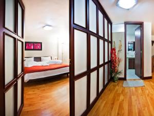 Ένα ή περισσότερα κρεβάτια σε δωμάτιο στο Loft Hotel