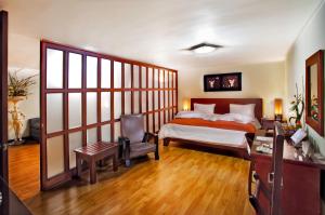 Ένα ή περισσότερα κρεβάτια σε δωμάτιο στο Loft Hotel